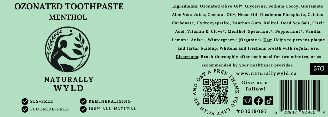 Back label of Naturally Wyld Ozonated Toothpaste highlighting natural ingredients like ozonated olive oil, aloe vera juice, neem oil, xylitol, hydroxyapatite, clove, menthol, spearmint, peppermint, and Dead Sea salt. Fluoride-free, SLS-free, with organic essential oils for oral health. Directions and QR code for gift scan included.