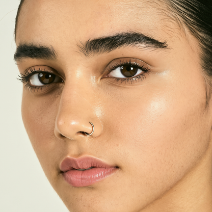 Model wearing MYCO Foundation 620 Light-Medium Cool - vegan mushroom-powered foundation for light-medium cool skin