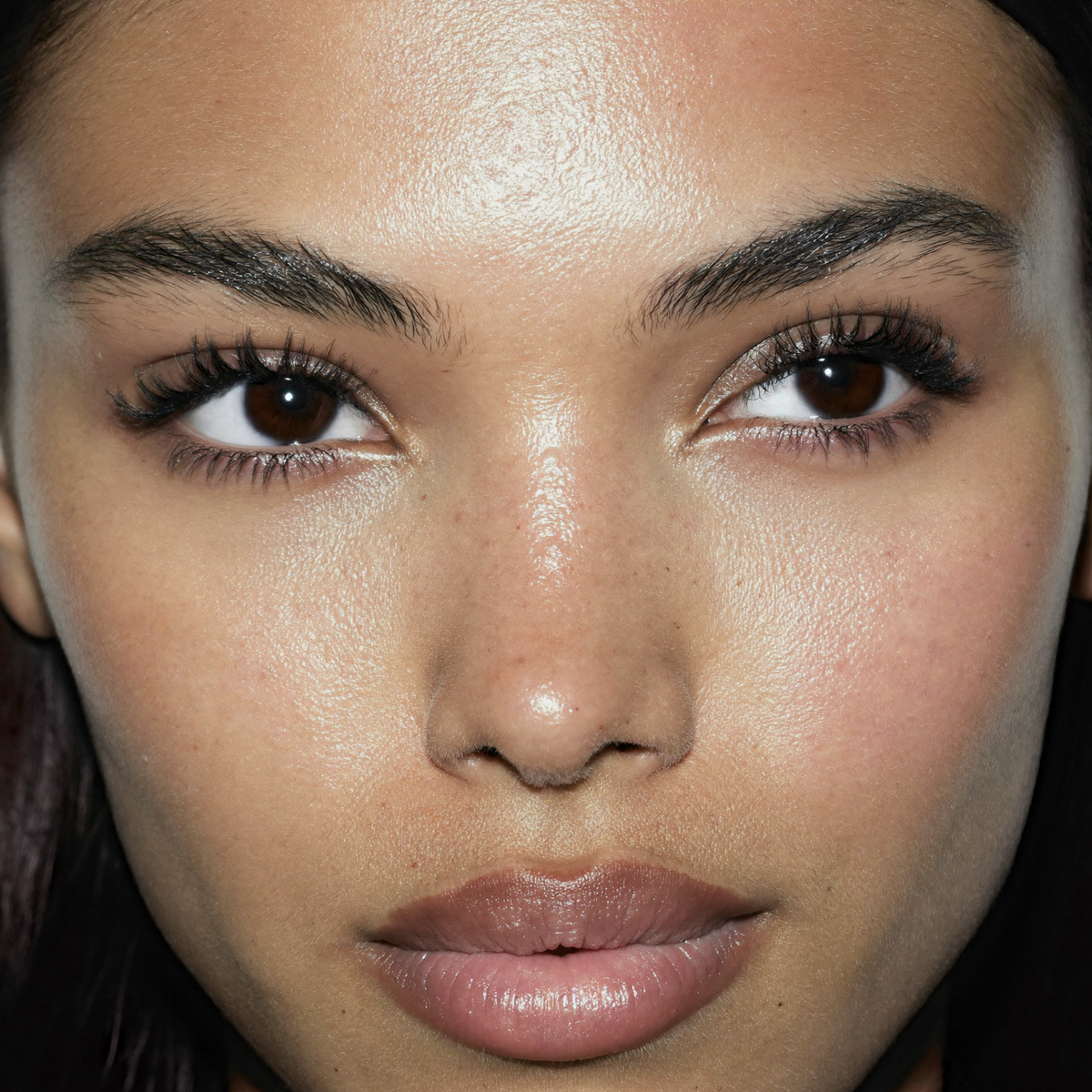 Model wearing MYCO Foundation 621 Light-Medium Neutral - vegan mushroom-powered foundation for light-medium neutral skin