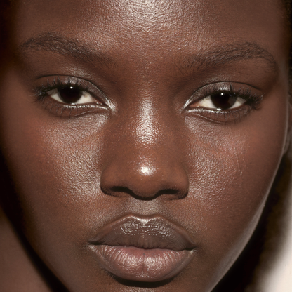 Model wearing MYCO Foundation 640 Deep Cool - vegan mushroom-powered foundation for deep cool skin
