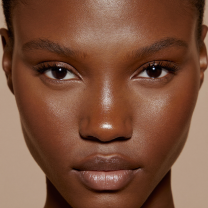 Model wearing MYCO Foundation 649 Dark Warm - vegan mushroom-powered foundation for dark warm skin