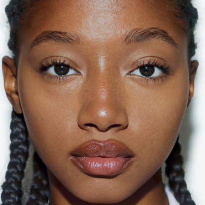 Model wearing MYCO Foundation 653 Tan Neutral - vegan mushroom-powered foundation for tan neutral skin