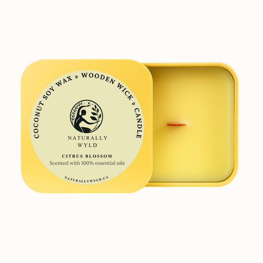 Naturally Wyld Citrus Blossom candle made with wooden wick and coconut soy wax, featuring bright citrus and light floral essential oils