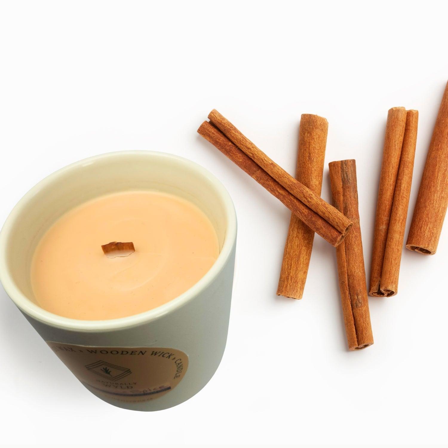 Naturally Wyld Orange Spice Coconut Soy Wax Wooden Wick Candle. Fragrance-Free Wood Wick Candles, Essential Oil Infused Candles, Clean Candles, Zero Fragrance Soy Candles, Canadian Natural Wooden Wick Candles . Front, Next to Cinnamon 