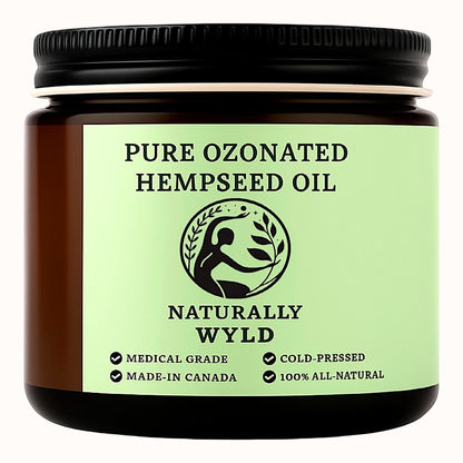 Amber jar labeled Pure Ozonated Hempseed Oil by Naturally Wyld. Cold-pressed, 100% all-natural skincare oil made in Canada. Medical-grade hemp oil rich in omega fatty acids for natural healing.