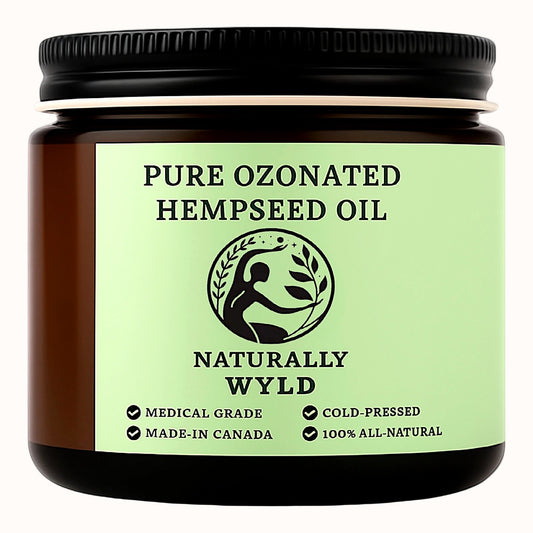 Amber jar labeled Pure Ozonated Hempseed Oil by Naturally Wyld. Cold-pressed, 100% all-natural skincare oil made in Canada. Medical-grade hemp oil rich in omega fatty acids for natural healing.