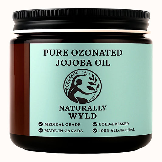 Amber glass jar labeled Pure Ozonated Jojoba Oil by Naturally Wyld. Cold-pressed, medical-grade jojoba oil, made in Canada. 100% all-natural skincare treatment in eco-friendly packaging.