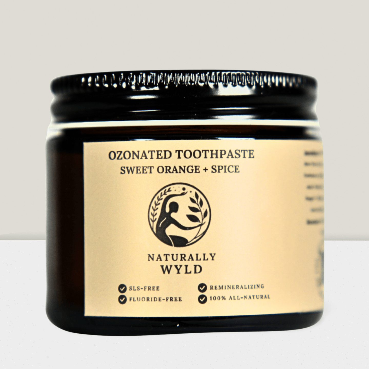 Naturally Wyld Ozonated Sweet Orange + Spice Toothpaste, Front label, ozonated oil, Ozonated toothpaste, Natural Toothpaste