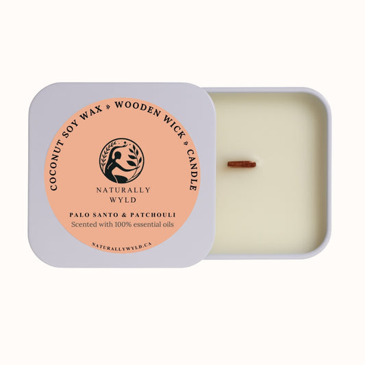 Naturally Wyld Palo Santo and Patchouli candle in a reusable tin, hand-poured with coconut soy wax and wooden wick for a grounding, earthy scent