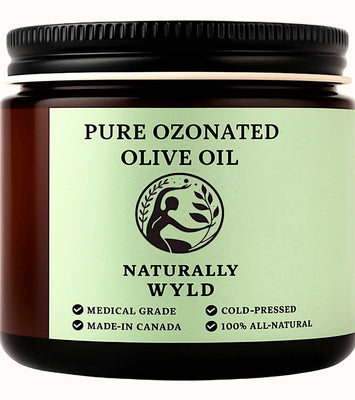 Amber jar of Naturally Wyld Pure Ozonated Olive Oil. Cold-pressed, medical-grade olive oil balm made in Canada. 100% all-natural, stored in a dark glass jar to preserve quality.