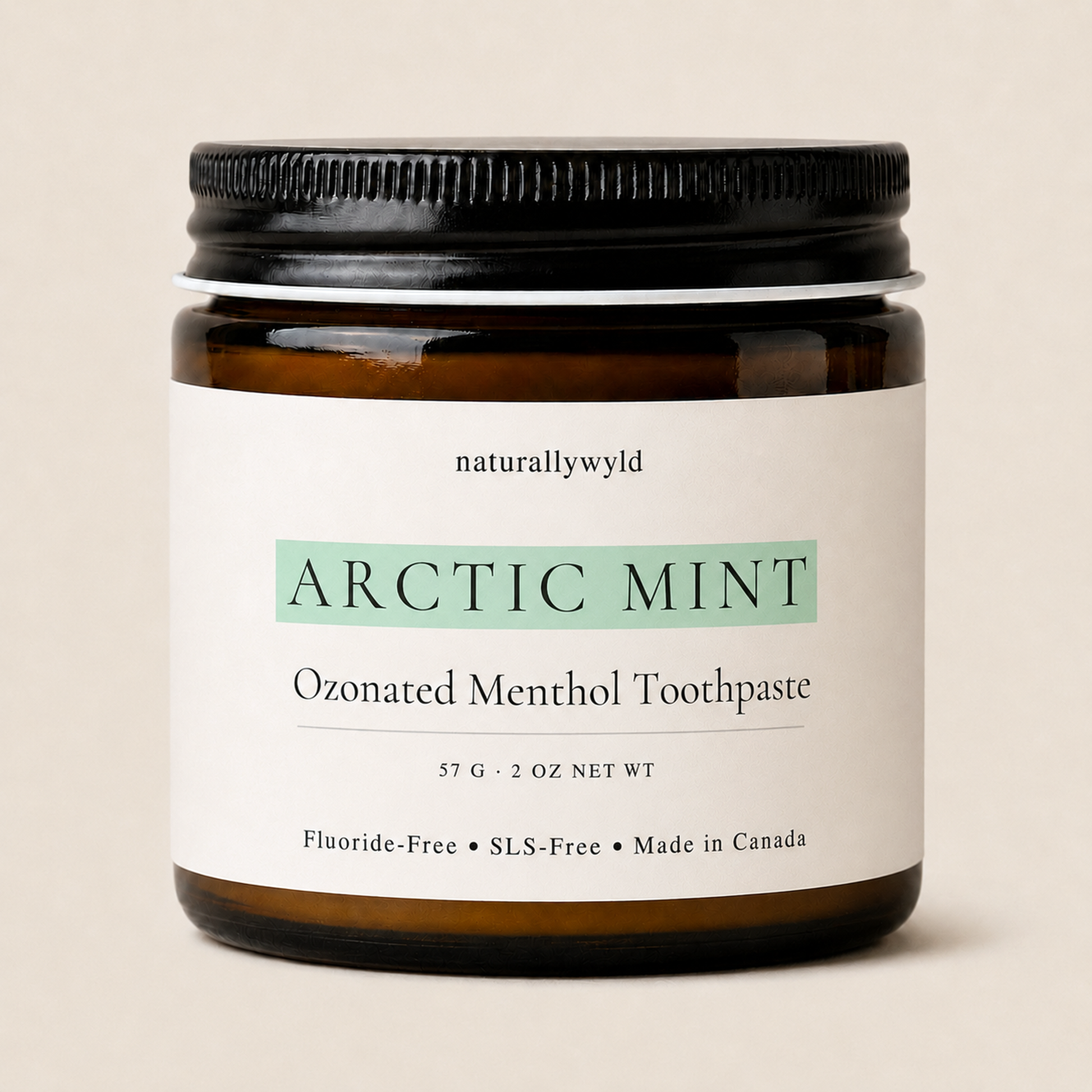 Arctic Mint ozonated menthol toothpaste in amber glass jar by Naturally Wyld