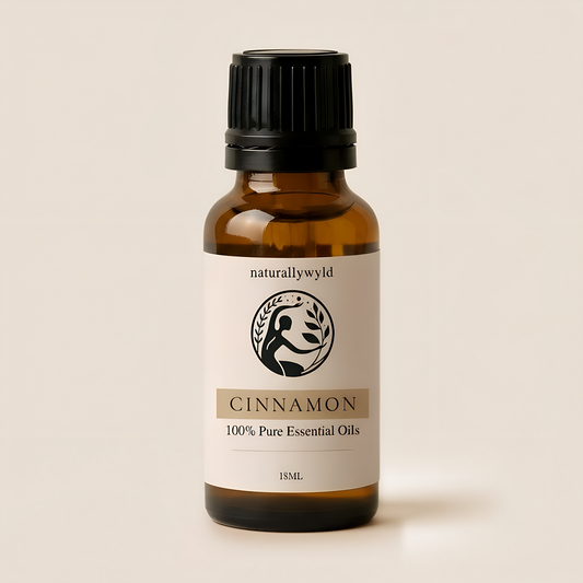 Amber 18ml dropper bottle of Naturally Wyld Pure Cinnamon Essential Oil with warm camel tan label