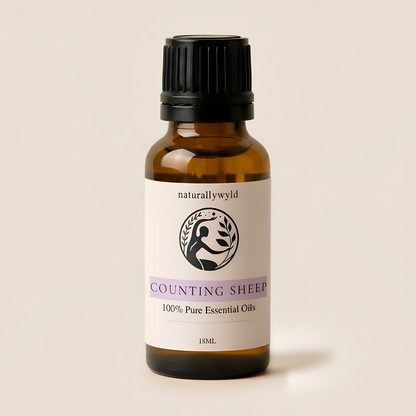 Amber 18ml dropper bottle of Naturally Wyld Counting Sheep essential oil sleep blend with light lilac label