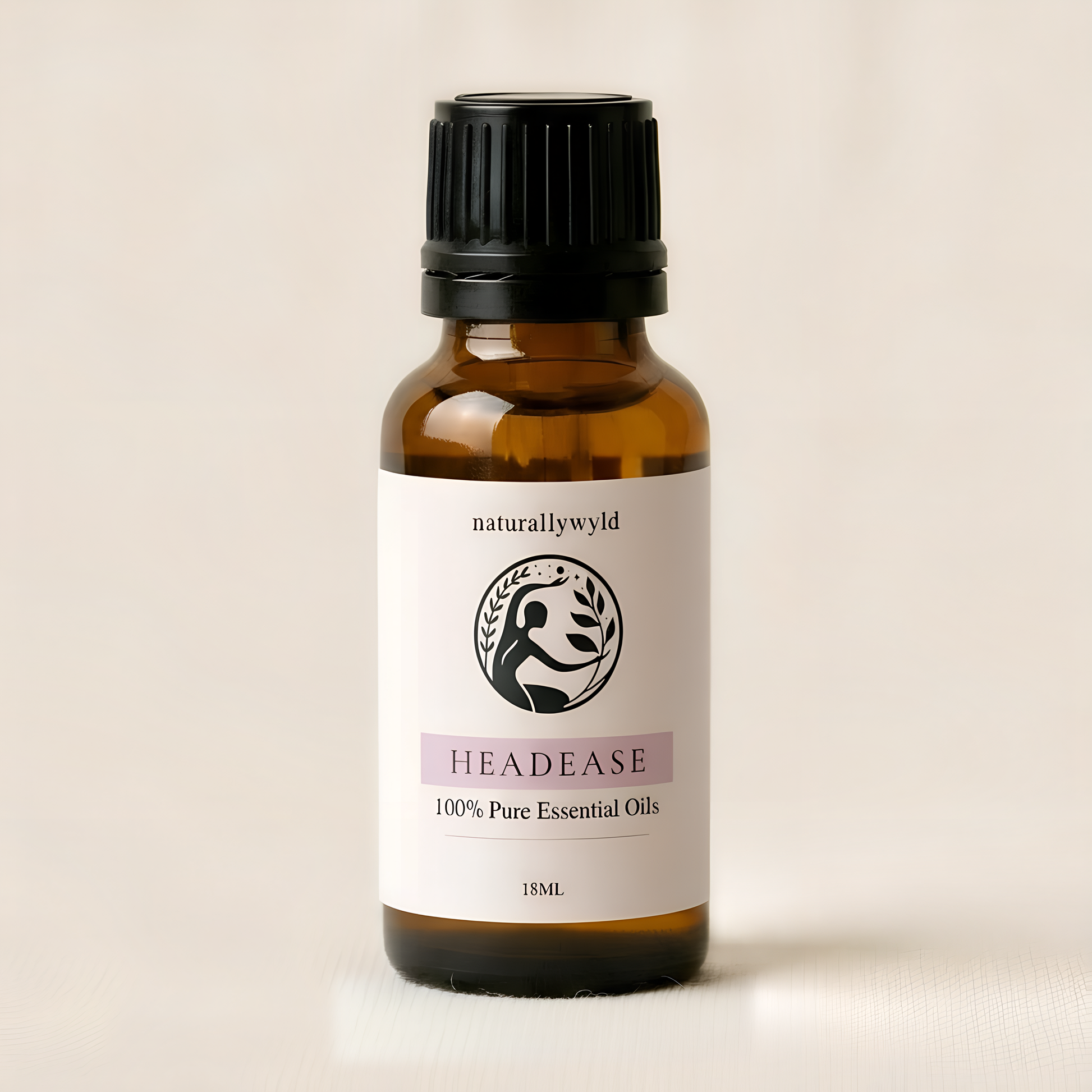 Amber 18ml dropper bottle of Naturally Wyld Head-Ease essential oil blend with dusty mauve pink label