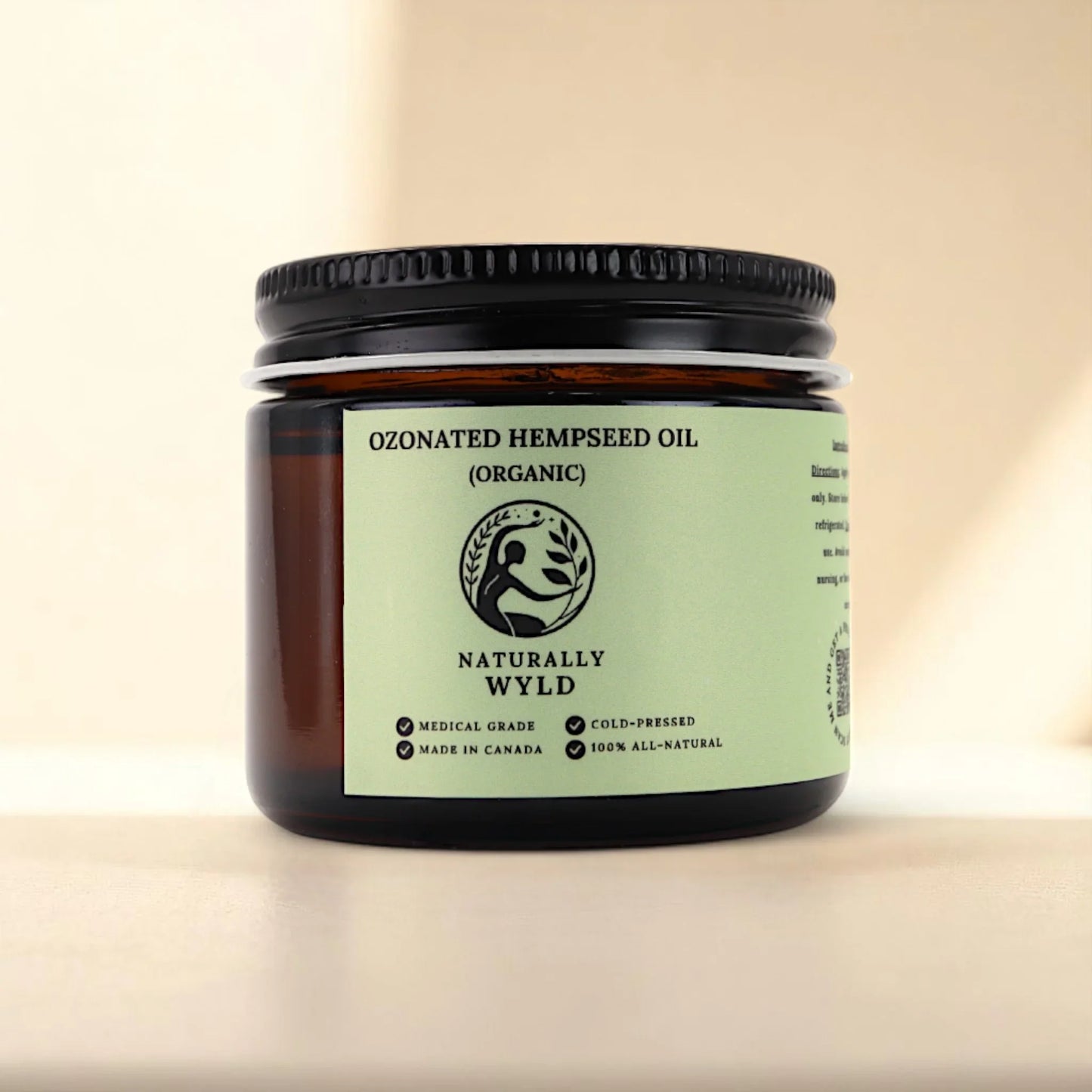 Naturally Wyld ozonated hemp seed oil front label – cold-pressed organic hemp oil infused with ozone, commonly used in natural skincare routines for those seeking support with acne-prone skin, irritation, dry patches, or overall skin clarity; handmade in Canada in small batches with all-natural ingredients.