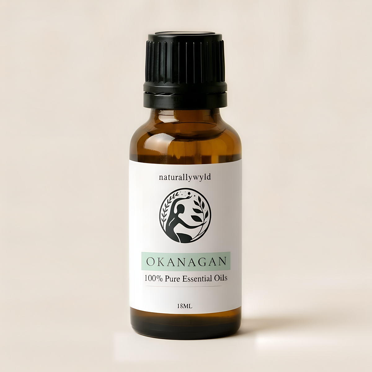 Amber 18ml dropper bottle of Naturally Wyld Okanagan essential oil blend with soft sage green label