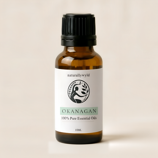 Amber 18ml dropper bottle of Naturally Wyld Okanagan essential oil blend with soft sage green label