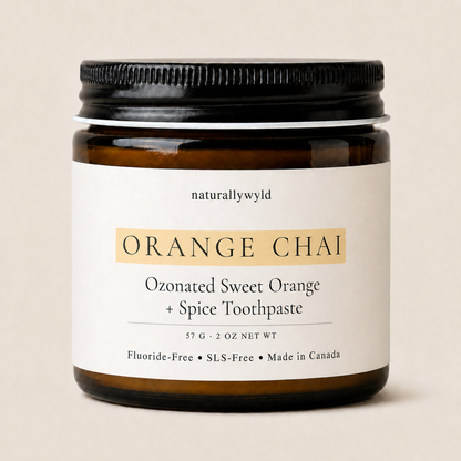 Orange Chai ozonated toothpaste in amber glass jar by Naturally Wyld