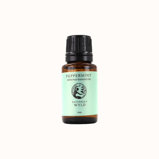 15ml amber glass bottle of Naturally Wyld Peppermint Essential Oil with green label and black cap