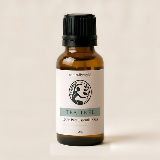 Amber 18ml dropper bottle of Naturally Wyld Pure Tea Tree Essential Oil with grey-sage green label