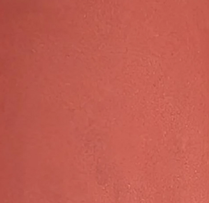 Terracotta Sunset fruit-pigmented multi-stick texture swatch — warm sun-baked rust-orange shade